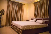 Taverna Guest House فنادق في Ota