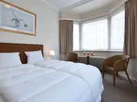 Former Hotel in the Centre and Near the Beach in Panne