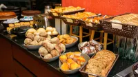 Quality Suites Alphaville - servizio colazione