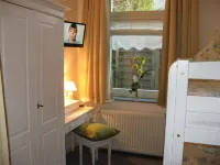 Apartment directly on the promenade, 1st row, parking lot included, 80m to the Baltic Sea