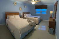 Ground floor condo with private beach.   Pet friendly