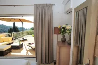 Luxury villa with private swimming pool and sea and sunset views