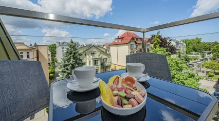 Baltic Apartments - Apartamenty Lissa Отели рядом с достопримечательностью «Свиноуйсьценский маяк»