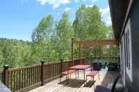 Aspen Glow Cabin - a charming 2-bedroom cabin with mountain views & wood stove