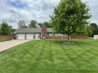4-bedroom home in Hutchinson with beautiful yard and patio. Pet friendly! Enjoy!