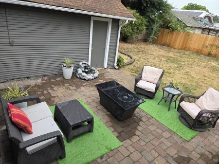 The Urban Boho Charmer with Private Backyard, BBQ & Hammock