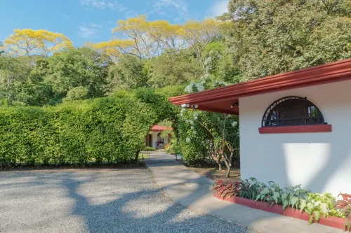 Private suite 103 with beautiful gardens, shared pool and BBQ area!