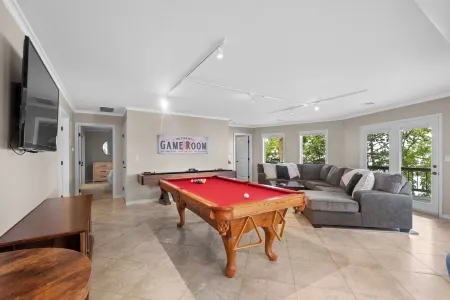 The Honeycomb House: Waterfront > Hot Tub > Game Room > Boat Dock