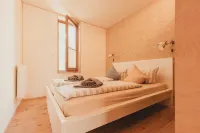 Modern wooden house on the Bodden with two apartments that can be combined Hotels in Loissin