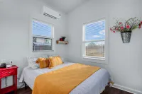 Charming Tiny House Retreat with Cozy Porch - Inviting Escape