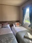 Cozy Caravan at Tower Lawn, Haggerston Castle Perfect Family Getaway - 2-Star
