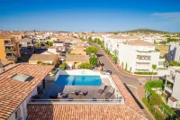 Hotel Grand Cap Rooftop Pool Hotels in Bessan