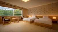 Shintamagawa Onsen Hotel a 