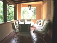 Large and very well furnished apartment in a villa, with garden and pool. D. Hotels in Sassetta