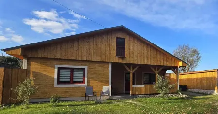 Large wooden house with sauna, in a quiet location by the bathing lake
