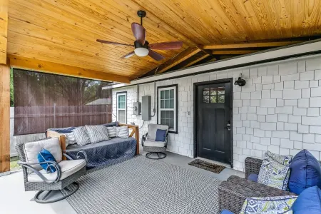 Front door parking, private covered patio with fenced in backyard