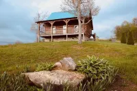 Blue Willow Cabin, high up on the hill with180 degree views.