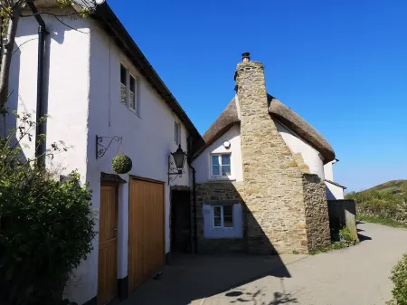 Croyde cottage with direct access to beach path, close to pubs and shops. Отели рядом с достопримечательностью «Гранта Бич»