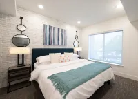 Pets Stay Free • King Bed • Walk to Downtown • Garage Parking • Elevator