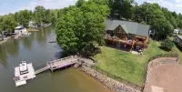 Private Lakefront Log House with Boat Dock