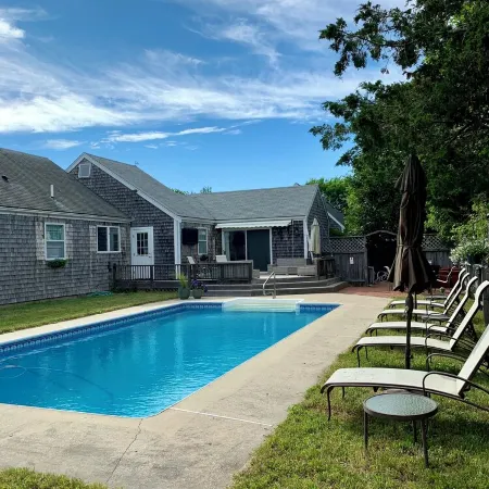 Mid island oasis with large pool and outdoor entertainment area. Pet friendly!