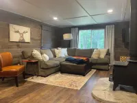 Minutes to town or very peaceful woods retreat! Close to trails and golf.