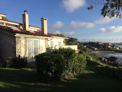 Casa Jardín Orilla del mar Frente a las Islas Cíes