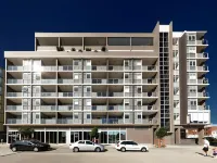 Honeysuckle Executive Apartments Отели в г. Ньюкасл