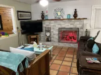 Charming water front cottage on Cane River with stunning sunroom & private decks
