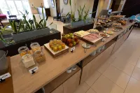 Howard Johnson Funes - Desayuno