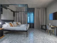 Hotel Nuvò Hotel berhampiran Kolam Renang Scandone
