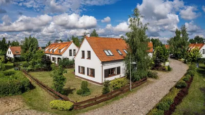 Domy Nad Jeziorem Sun & Snow Osada Zamkowa Hotels in Pasym