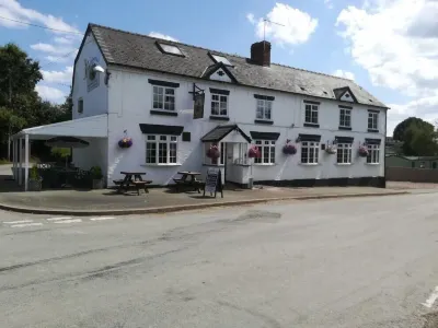 The Railway Inn Hotels near Glansevern Hall Gardens