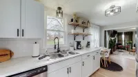 Touchdown Bungalow: Charming HOF Village Home