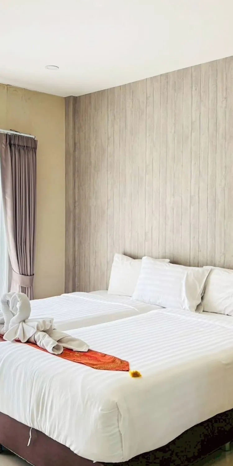 ห้องเตียงใหญ่หรือเตียงแฝดพร้อมวิวสระว่ายน้ำ