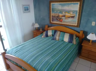 Beautiful fit, standing on the sand with spectacular sea views. Spotless Hotels near Empório Espaço Gourmet - Riviera de São Lourenço Bertioga,sp