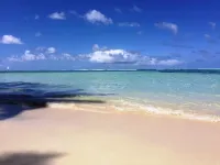 Vaka Beach Retreat- modern air conditioned apartment & steps to Vaimaanga Beach!