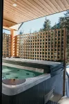 Family cabin sleeps 10 w/ hot tub, games room &  mountain views - 2 mins to base
