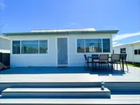 Lakeside House Tuncurry with deck overlooking the lake Hotels in Tuncurry