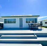 Lakeside House Tuncurry with deck overlooking the lake Hotels in Tuncurry