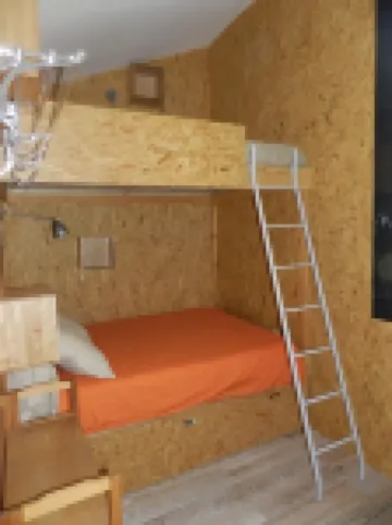 Wooden house in the golf, between forest, lake and ocean