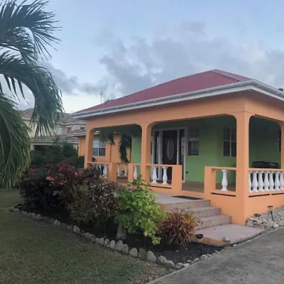 Large family villa with ocean view and gardens Hotels near VC Bird Monument