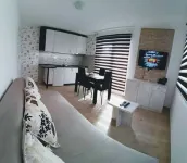 Cozy ground level apartment with outdoor access across from Kraljevi Čardaci.