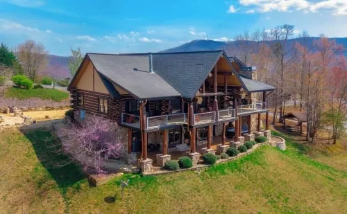 5500 sf cabin: 6 king/2 queen beds, heated pool/spa, game room, mountain views