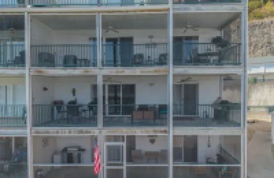 Lake of the Ozarks Premier lakefront 3-bedroom condo. Fishing, Swimming,boating.