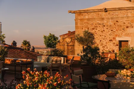 Palacio de Godoy Caceres, Curio Collection by Hilton