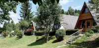 Wooden Chalet with Terrace Near Swimming Lake