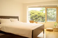 Jeju Backpaecus Villa فنادق في جيجو