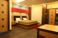 Hotel Trimoorti Hotels near M.P. Birla Planetarium