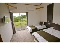 Sandal Wood Hotel dekat Bandara Tanegashima